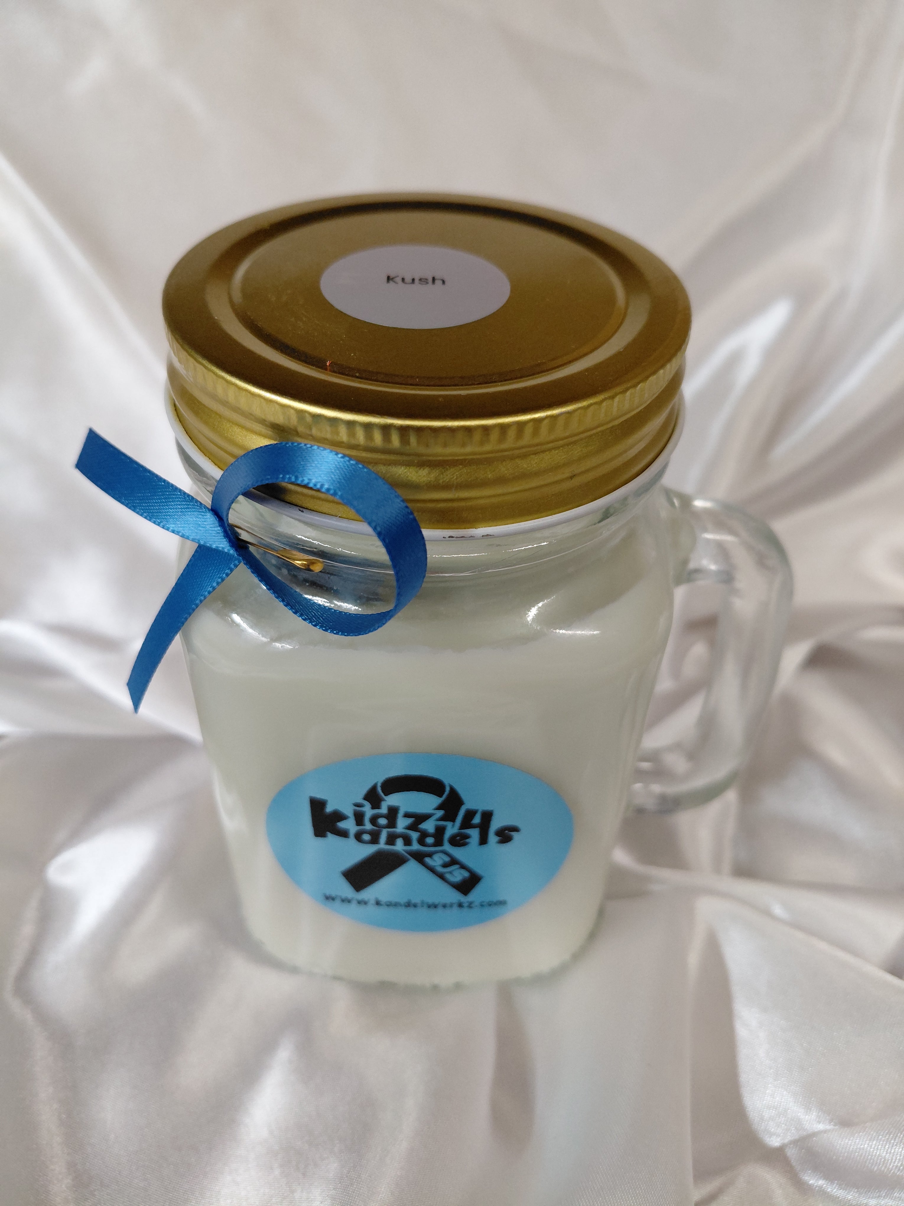 16oz Handmade scented kandel in a re-usable mug.