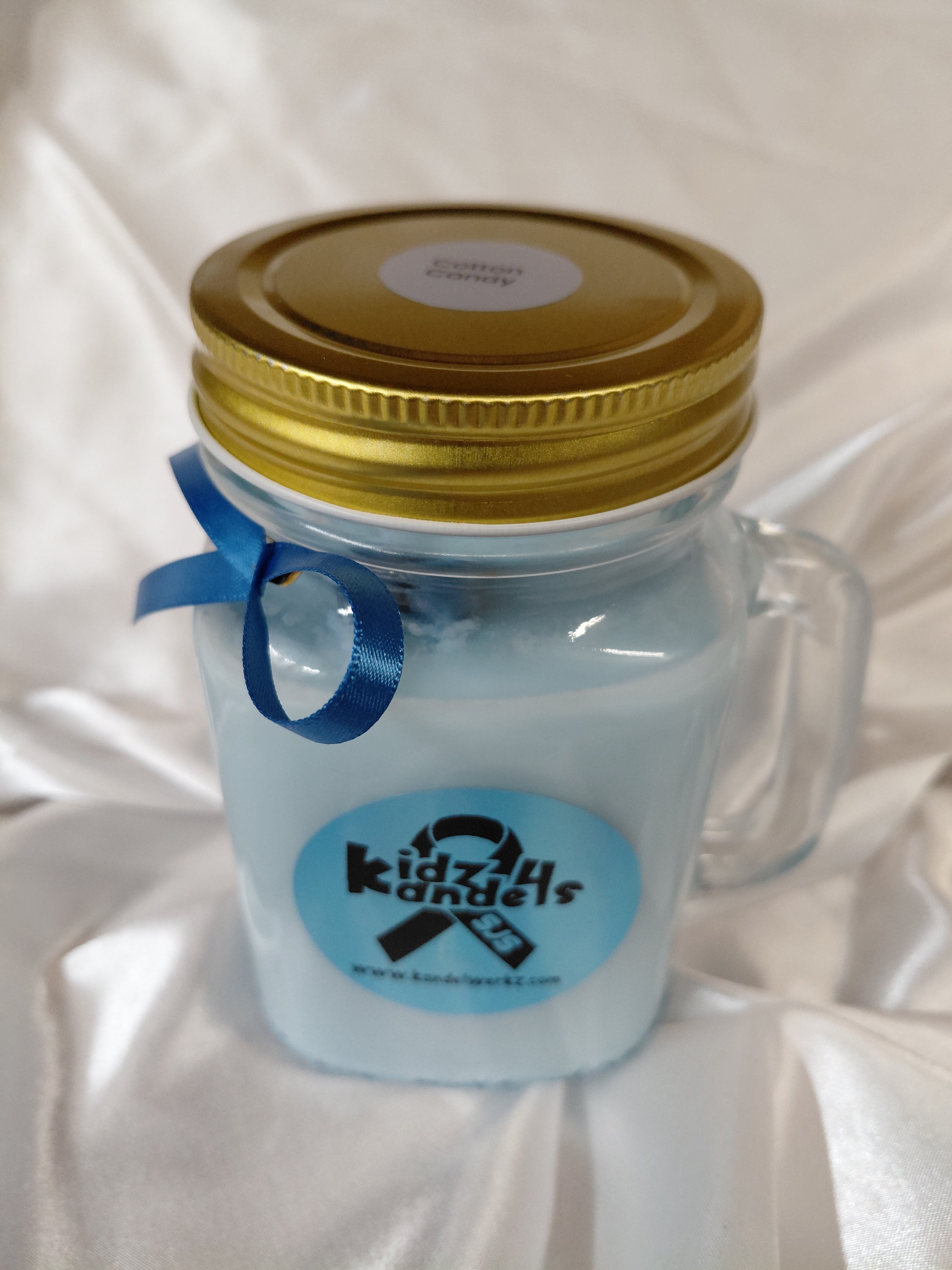 16oz Handmade scented kandel in a re-usable mug.